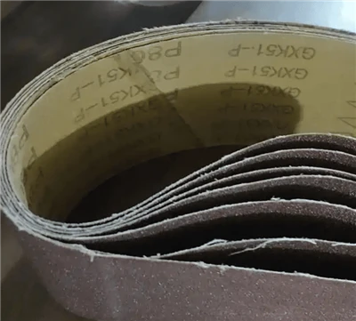 מהם החומר והמבנה של חגורת מלטש, וכיצד הם משפיעים על אפקט השחיקה שלו?